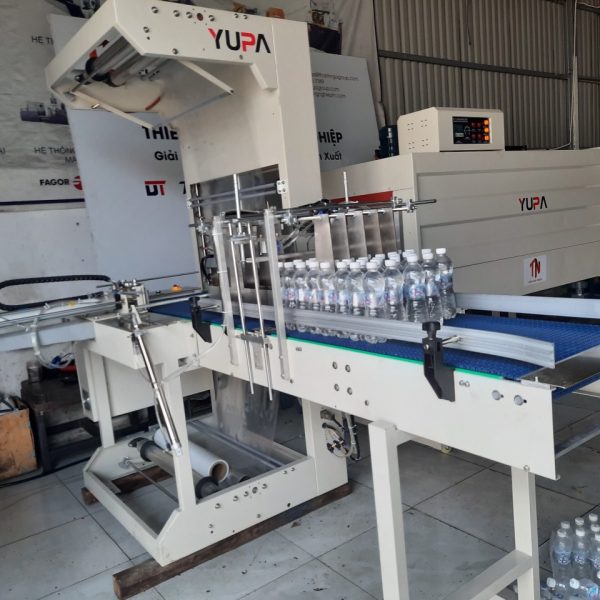 Alternative view of DÂY CHUYỀN MÁY CO MÀNG PE CHO LỐC CHAI TỰ ĐỘNG