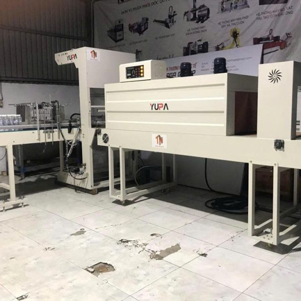 DÂY CHUYỀN MÁY CO MÀNG PE CHO LỐC CHAI TỰ ĐỘNG